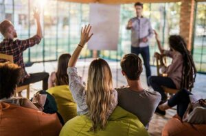 woman asking question in meeting